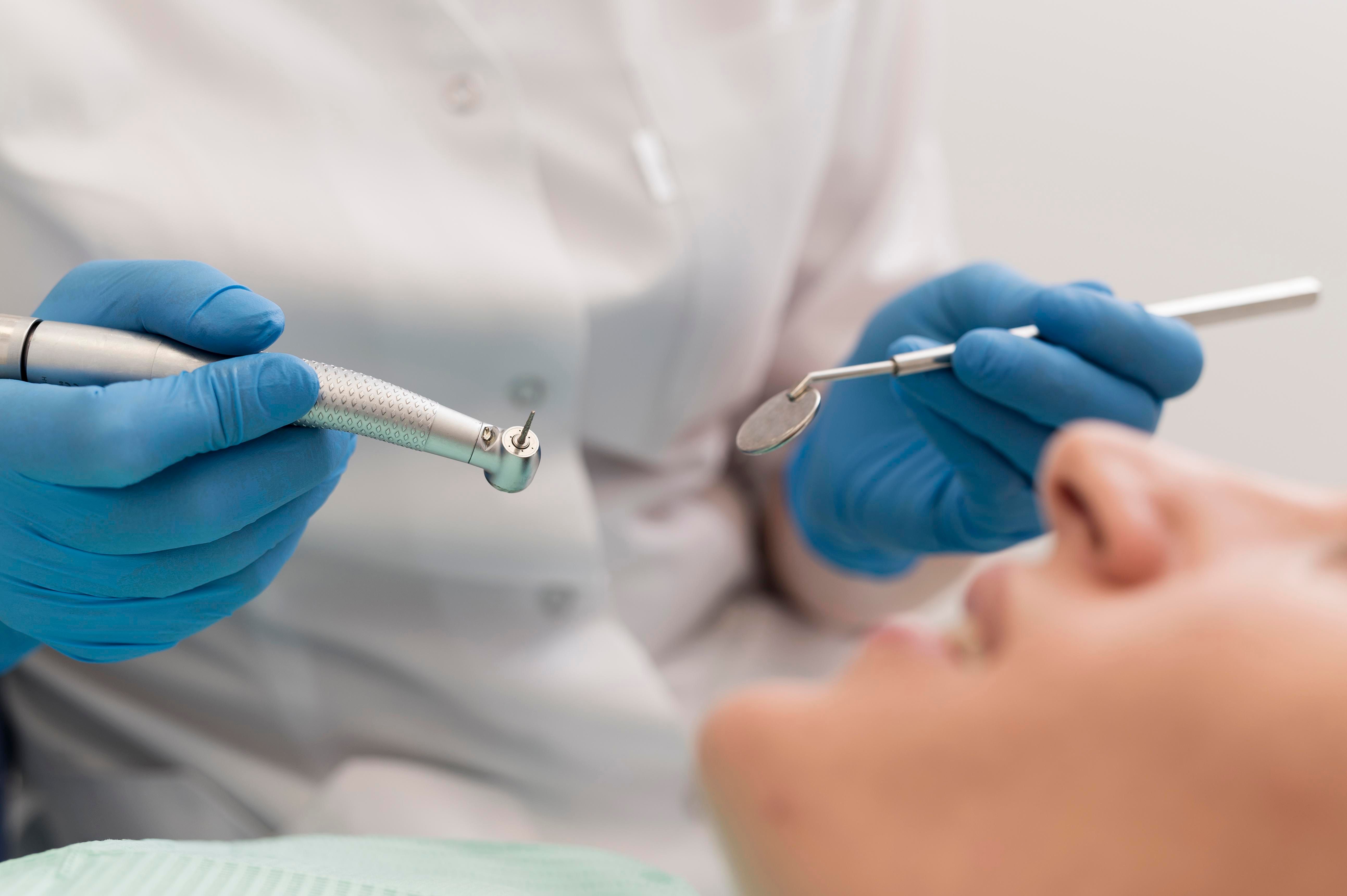 female-patient-having-procedure-done-dentist